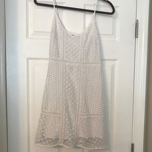 White spaghetti strap dress with thick lace detail